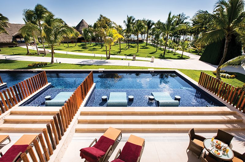 barcelo_maya-outside_pool_palm_trees