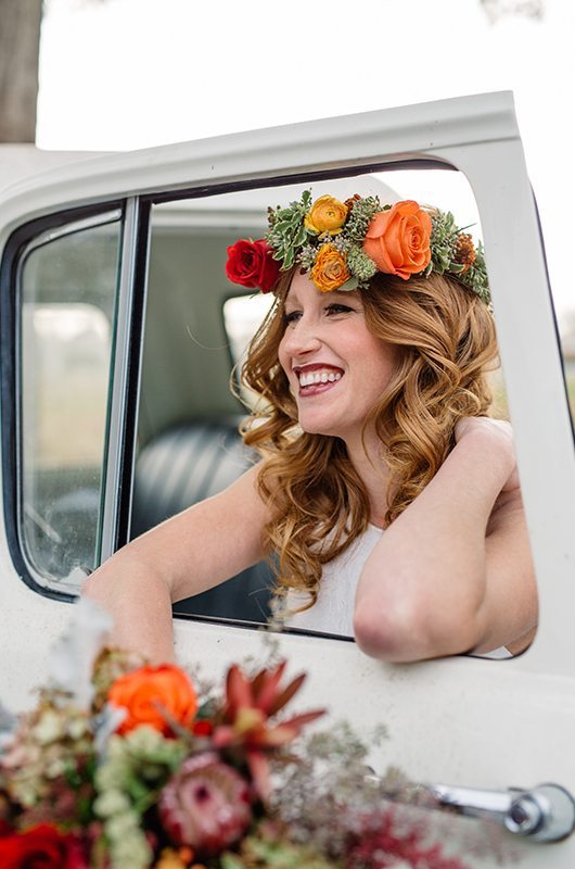 bohemian_fall_harvest-bride_car_smiling