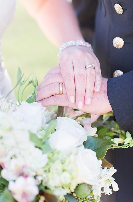 military_vineyard_anniversary-couple_hands_rings