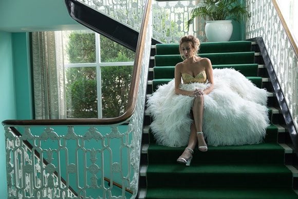 Kelly_Featanini’s_Fun_Feathery_Gown-Sitting_On_Green_Stairs