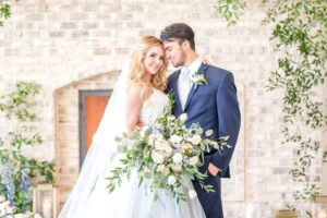 Dusty_Blue_Gold_Wrightsville_Manor_Wedding-couple_and_bouquet