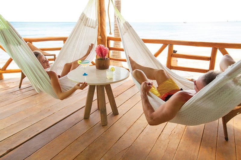 Mahekal_Beach_Resort_Mexico-Couple_In_Hammocks