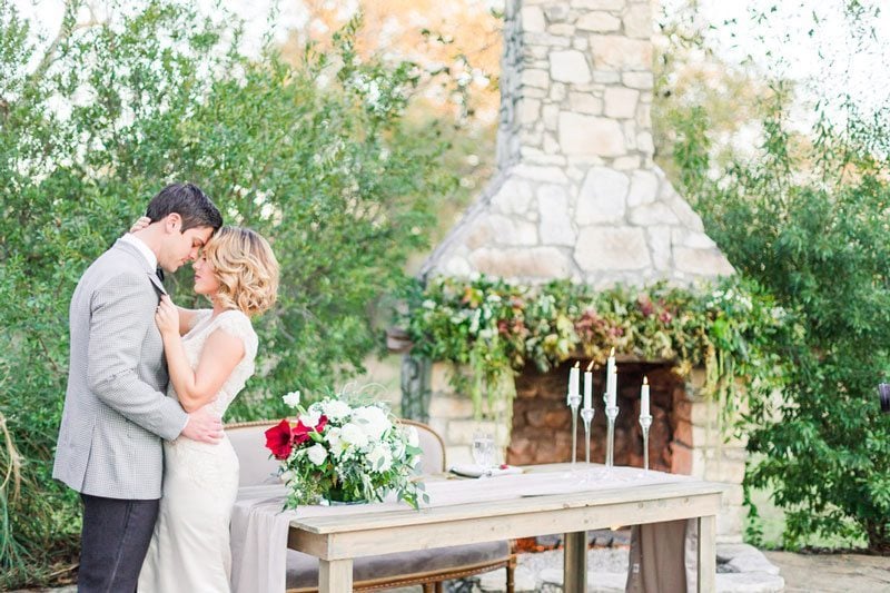 Modern_Ranch_Wedding_to_Remember-__AllisonJeffersWeddingPhotography_couple_by_farm_table