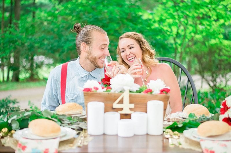 Red_White_and_Blue_Engagement_Party_Inspiration-Couple_Laughing