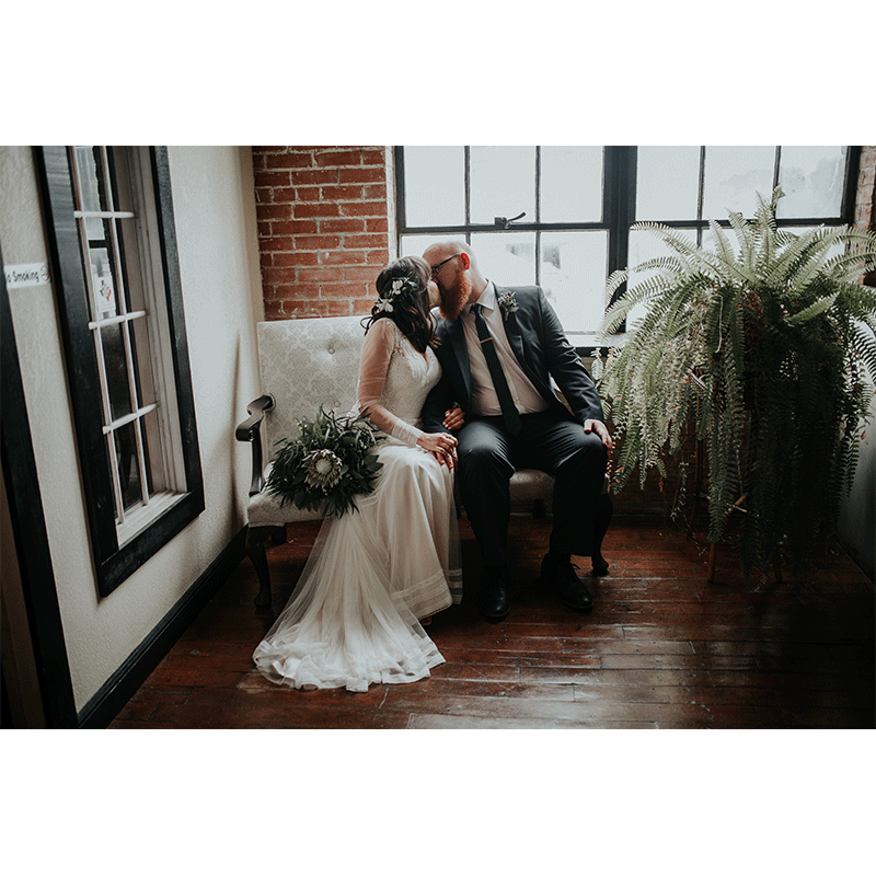 alchemy events nola bride and groom kiss