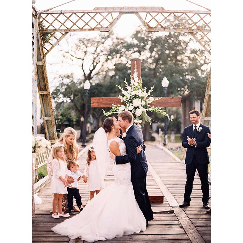 alchemy events nola wedding ceremony cross backdrop