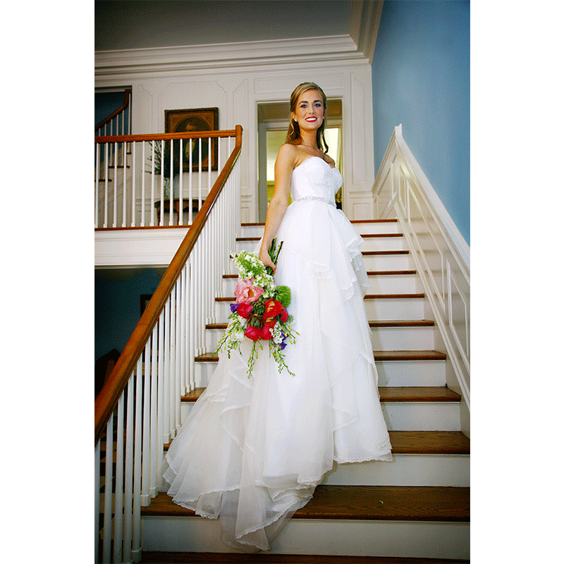 Snowden House bride on staircase wedding dress bouquet