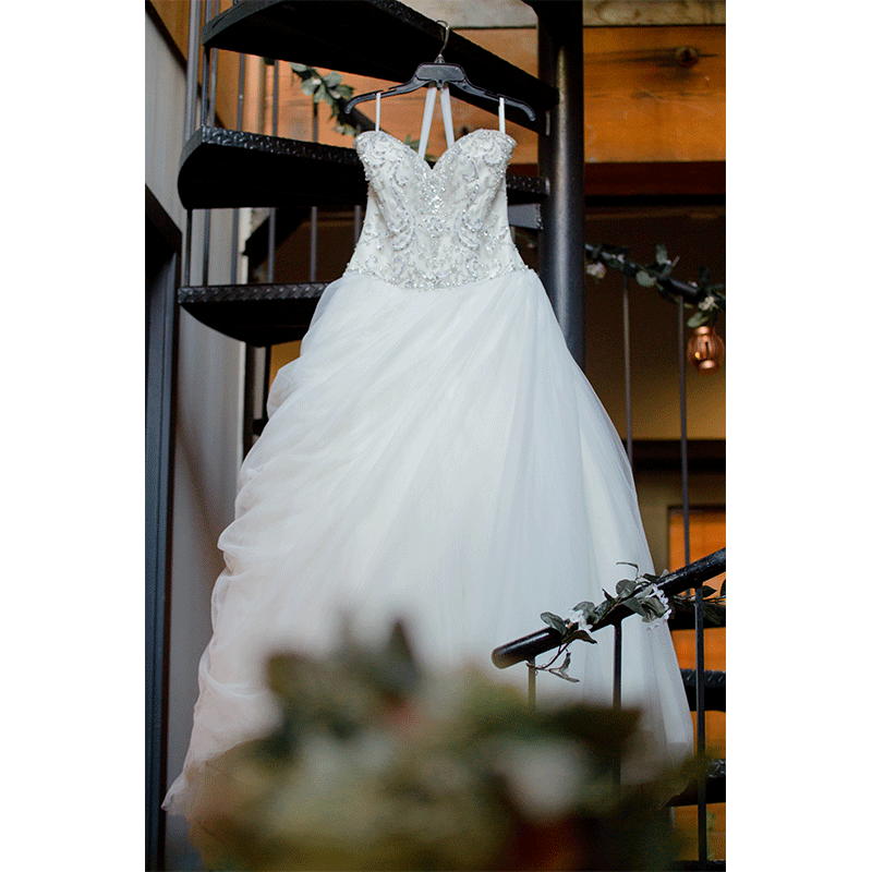 The Candy Factory Suites Wedding dress hanging