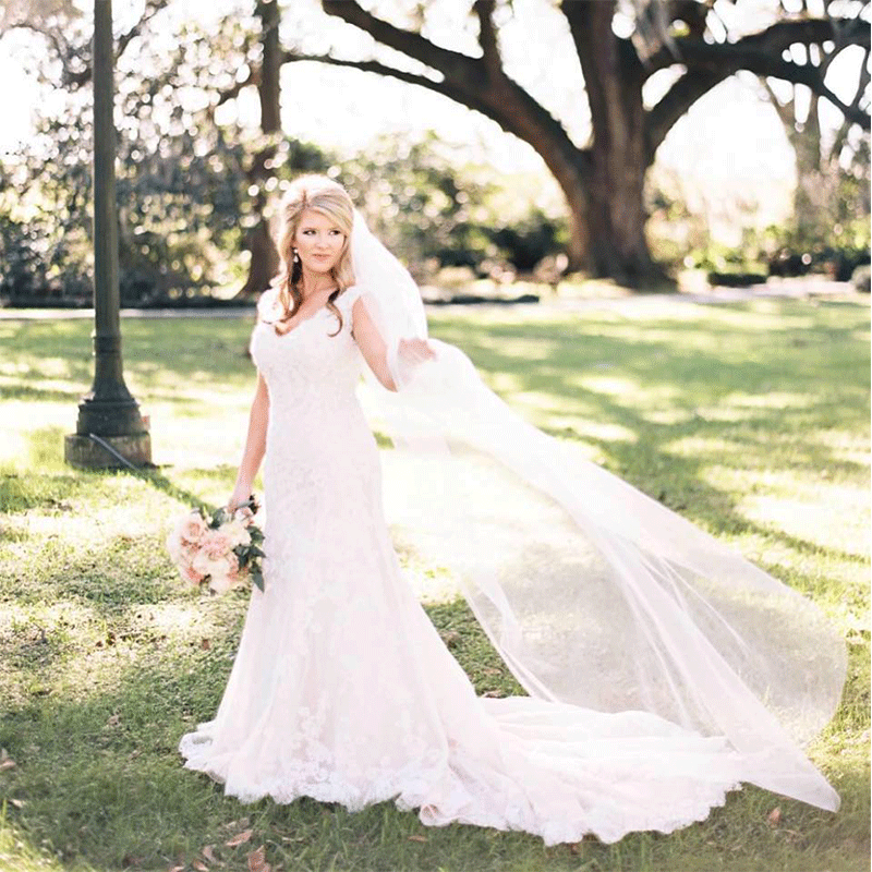 verde beauty bride standing in grass