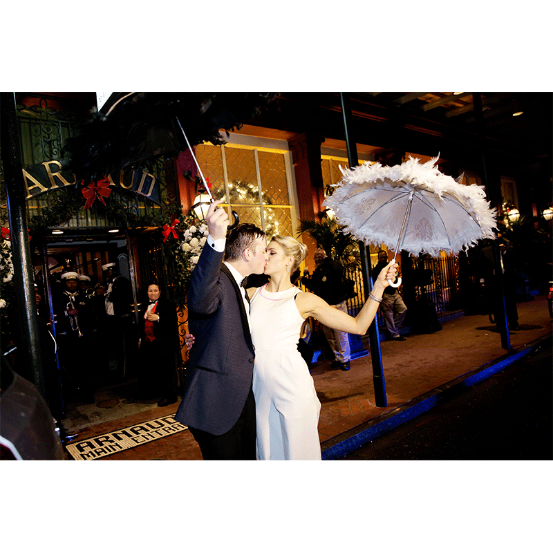 z event company umbrella bride and groom