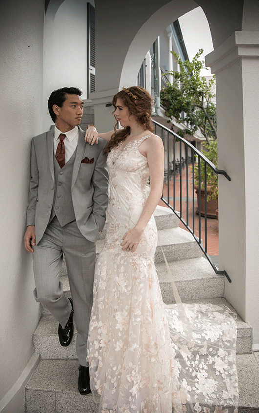 Claire_Pettibone-suit_and_gown_on_stairs