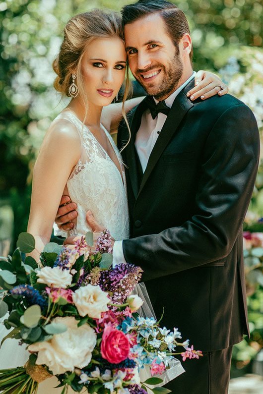 French_Inspired_Shoot-bride_and_groom_with_flowers