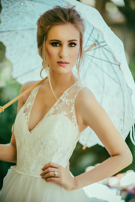 French_Inspired_Shoot-bride_holding_umbrella