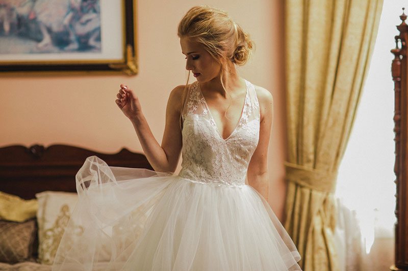 French_Inspired_Shoot-wedding_gown_by_window