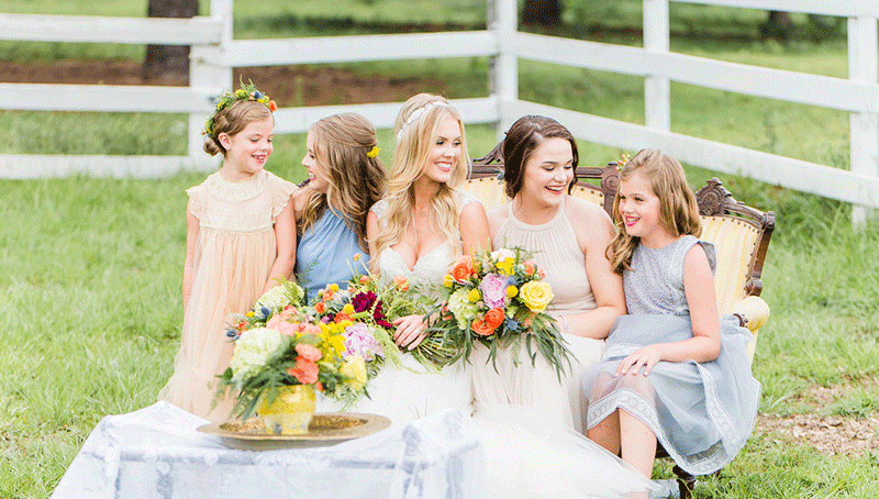 Lemon_Lime_Southern_Wedding_Inspiration-bride_and_bridal_party_on_couch