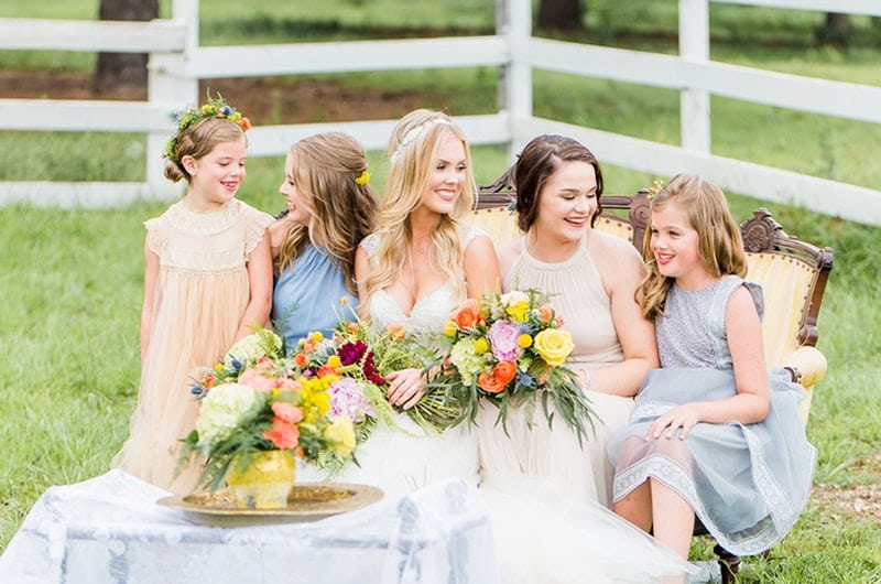 Lemon_Lime_Southern_Wedding_Inspiration-bride_and_bridal_party_on_couch