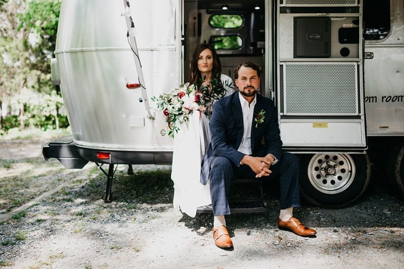 Maroon_Inspiration-bride_and_groom_sitting_landscape