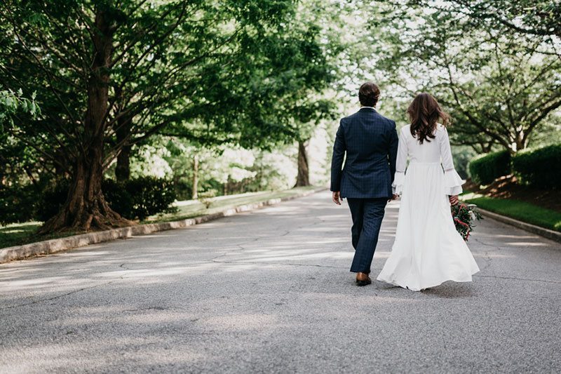 Maroon_Inspiration-bride_and_groom_walking