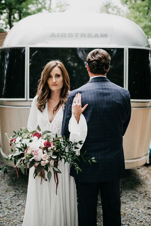 Maroon_Inspiration-bride_and_groom_with_ring