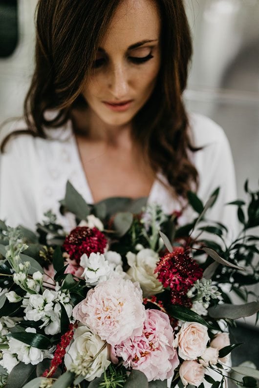 Maroon_Inspiration-bride_with_flowers