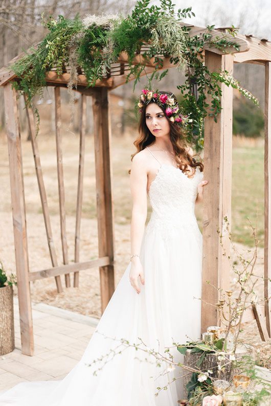 Outdoor_wedding_with_pops_of_color-bride_outside_with_flower_crown