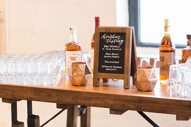 10_Ways_to_Make_Groom_Feel_Special-bourbon_on_table