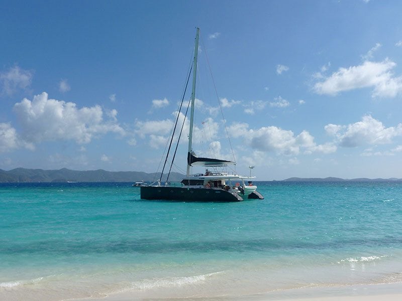 Amazing Charters Sail Boat On Blue Water