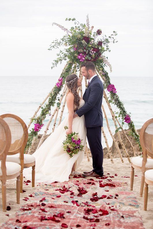 Chic_Coastal_Wedding-bride_and_groom_on_beach