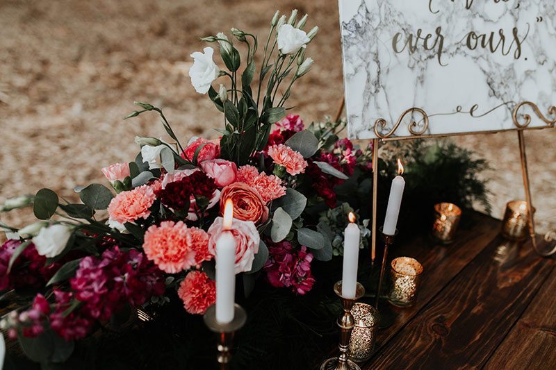 Enchanted_Forrest_Wedding-flowers_on_table_with_candles