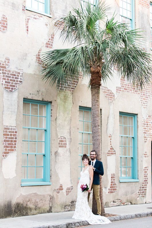 French_Boho-bride_and_groom_standing_under_palm_tree