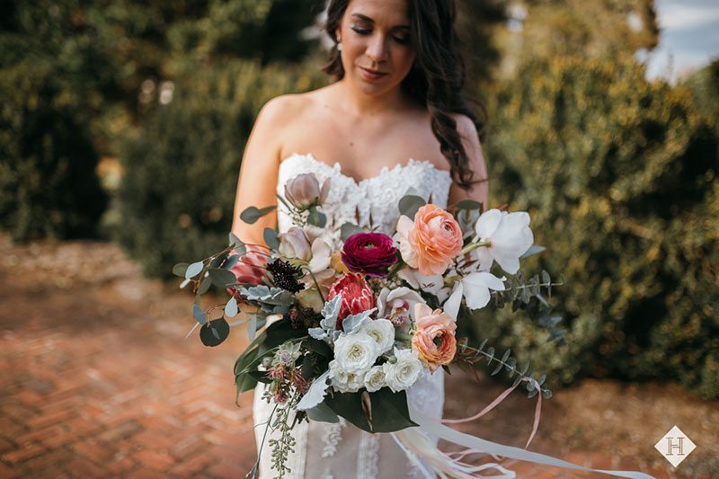 Modern_rustic_wedding-bride_holding_flowers