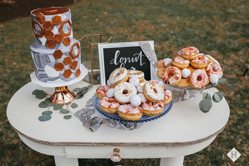 Modern_rustic_wedding-cake_with_donuts_and_desserts