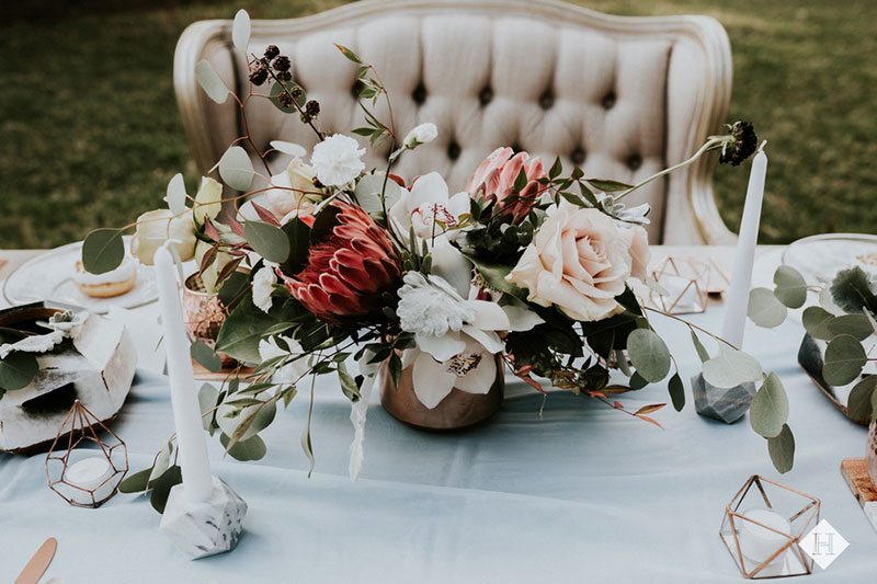 Modern_rustic_wedding-table_with_flowers_and_chair