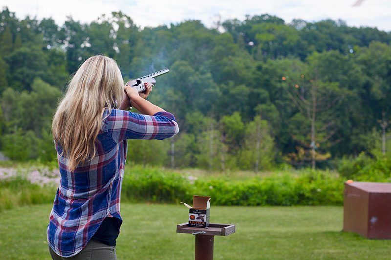 The American Club Girl Shooting Outdoors