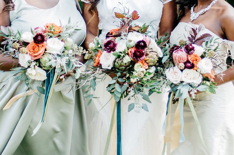 Big Fake Wedding 2 Brides Holding Flowers
