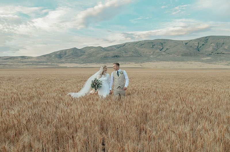 Bountiful Wheat Harvest Bride And Groom In Field