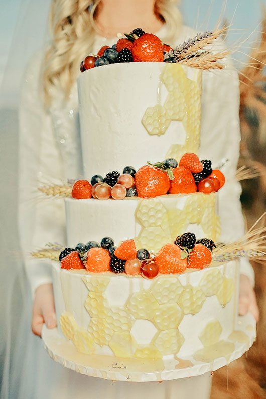 Bountiful Wheat Harvest Bride Holding Cake