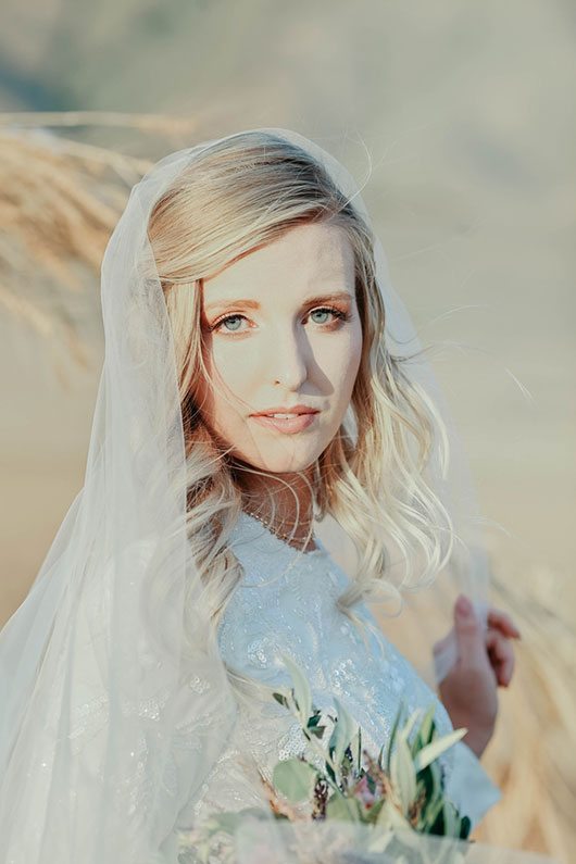 Bountiful Wheat Harvest Bride Holding Flowers