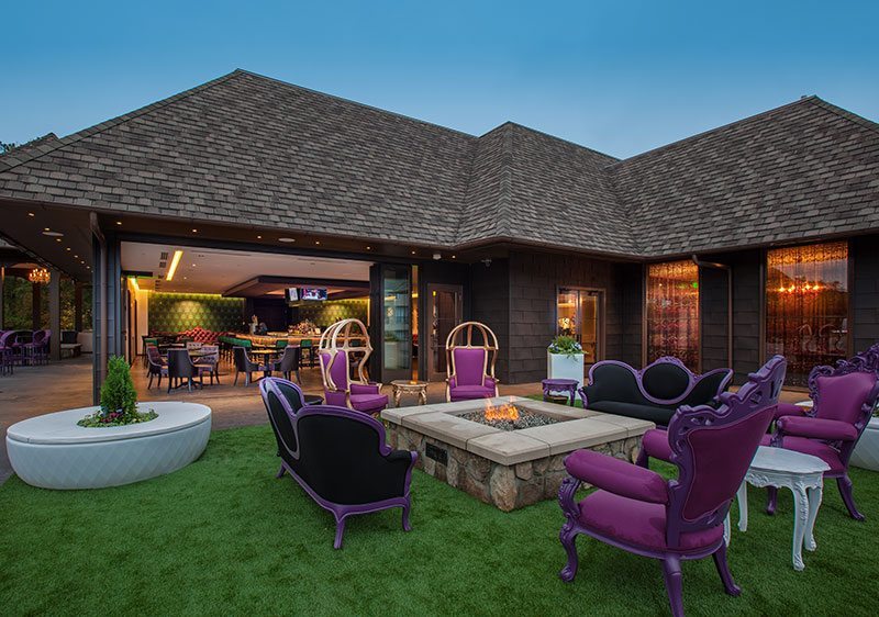 Grand Bohemian Roof Top Area With Purple Chairs