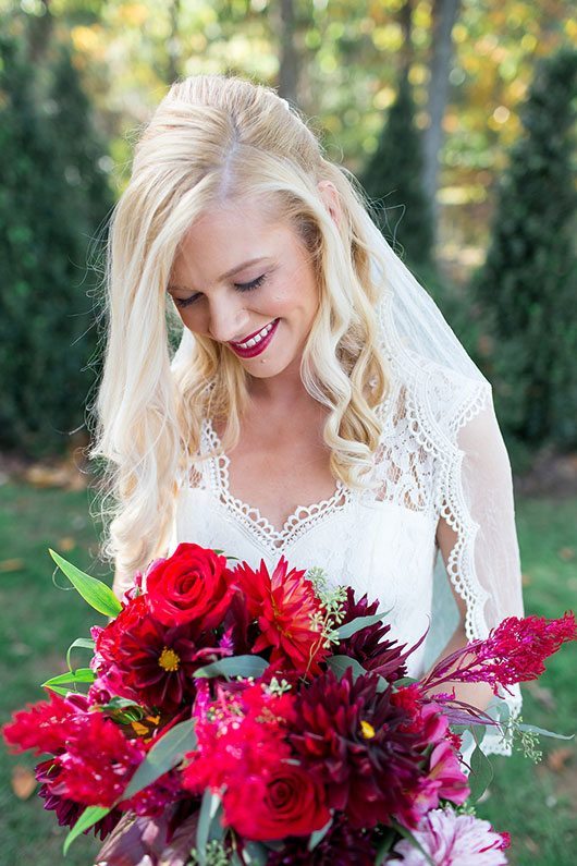 Halloween Wedding Bride Smiling With Flowers