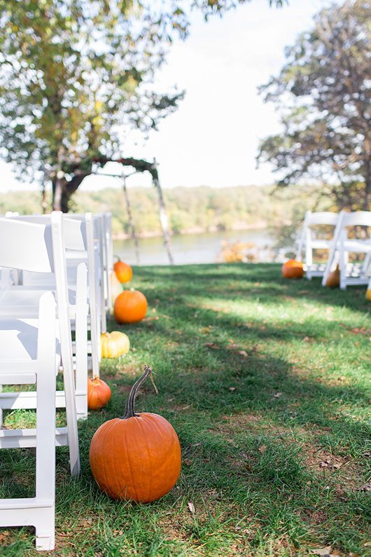 Halloween Wedding White Chairs And Pumpkins