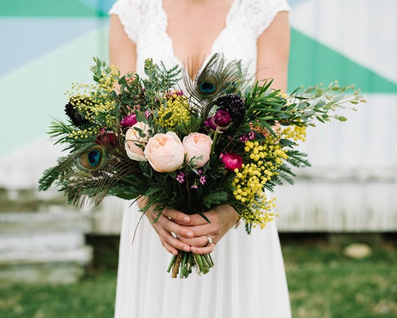 Modern Boho Bride Holding Flowers