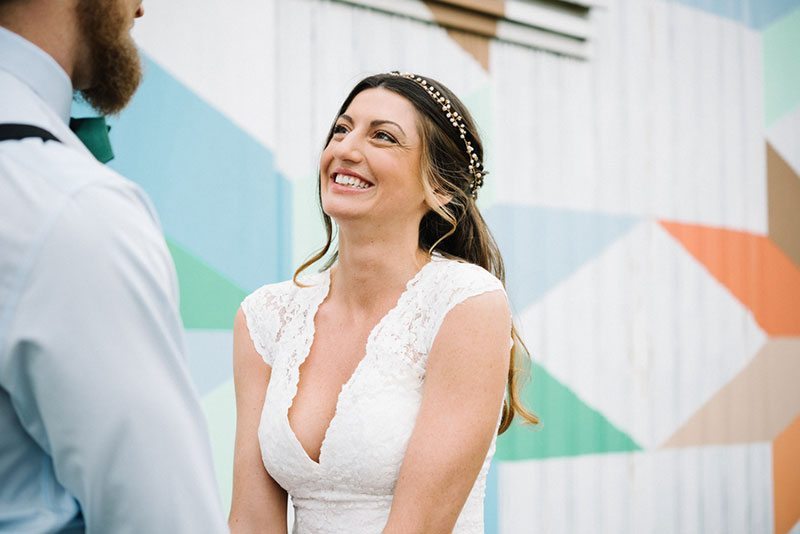 Modern Boho Bride Laughing With Groom