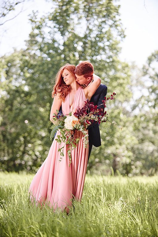 Pink Wedding Bride And Groom Hugging