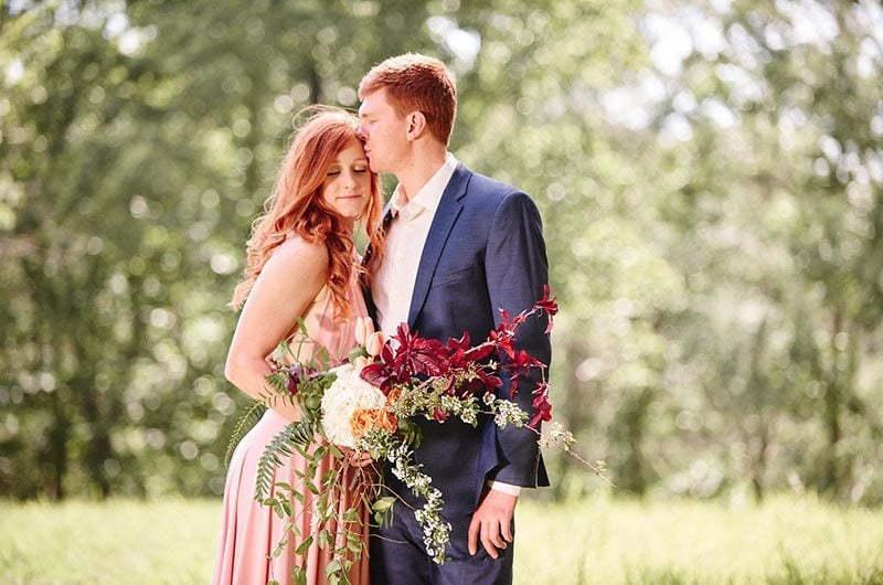 Pink Wedding Bride And Groom In Field