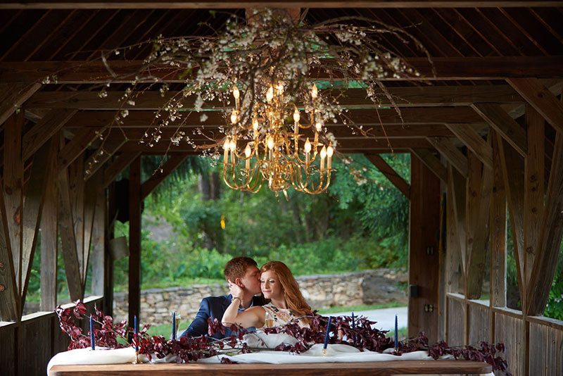 Pink Wedding Bride And Groom In Wooden Bridge