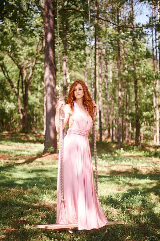 Pink Wedding Bride In Pink Dress On Swing