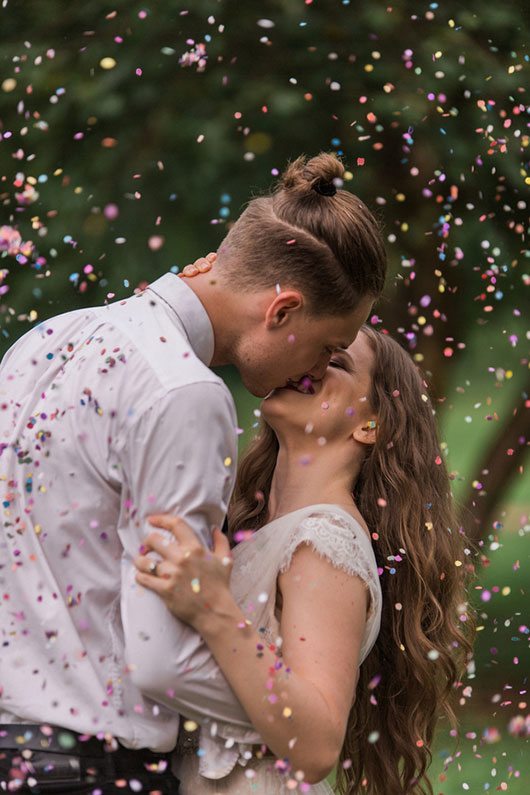 Rain Over Atlanta Bride And Groom Closeup With Confetti