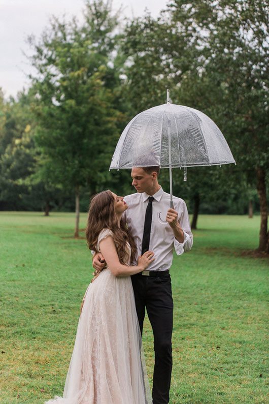 Rain Over Atlanta Bride And Groom Under Umbrella