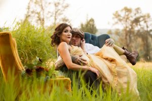 Snoqualmie Falls Bride And Groom Sitting On Blue Chair